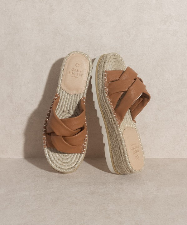 Brown, strappy, slip-on sandal with a 2.25" platform.