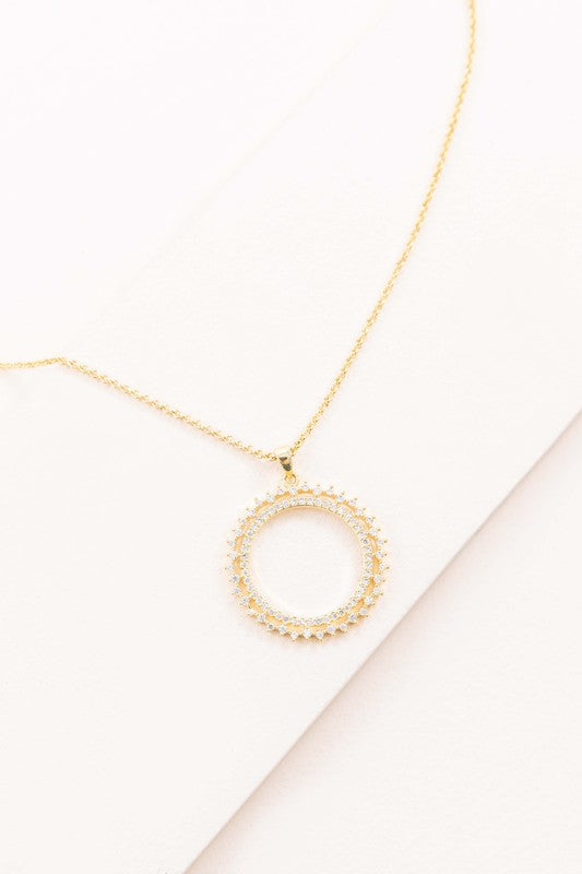 Gold tone necklace with a 2.25-inch pendant and a 31-inch chain length. Features a luxurious 24K gold-plated finish and a secure lobster clasp.