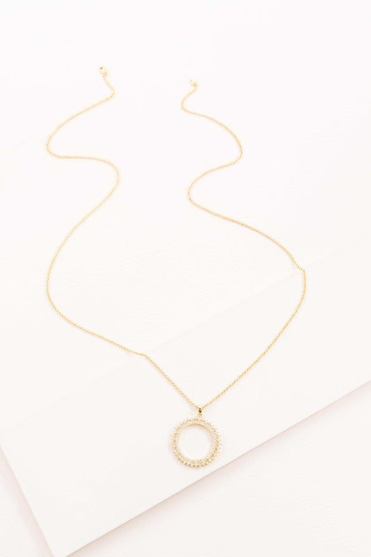 Gold tone necklace with a 2.25-inch pendant and a 31-inch chain length. Features a luxurious 24K gold-plated finish and a secure lobster clasp.