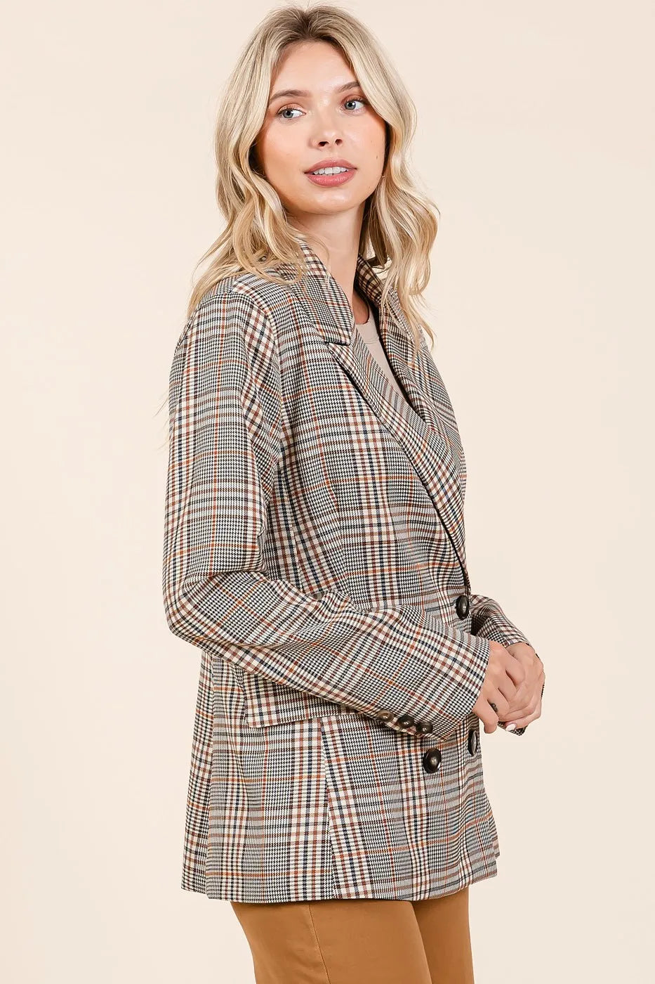 Side view of the Lennon Plaid Blazer showing the relaxed fit and structured silhouette