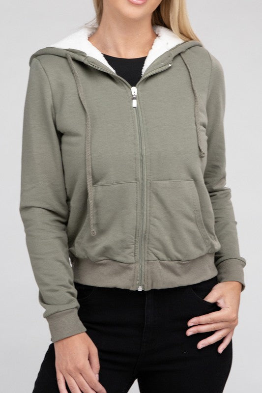 Military green cropped zip-up hoodie with fuzzy trim, pockets, and long sleeves.