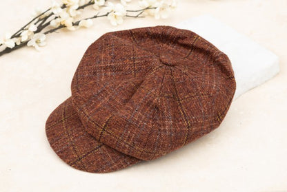 Kitt Plaid Newsboy Cap in Rust, plaid tweed fabric and structured crown