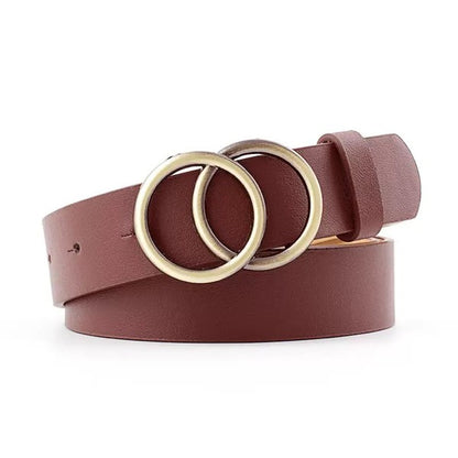 Flat lay of brown Double O-Ring Belt with antique bronze double O-ring buckle.