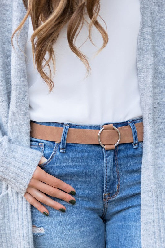 Camel-colored vegan leather belt with silver O-ring buckle.