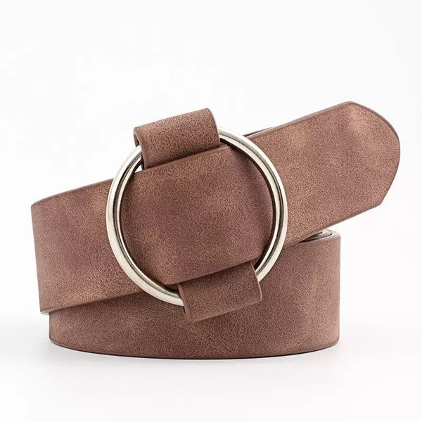 Taupe vegan leather belt with silver O-ring buckle.