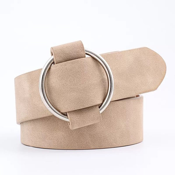 Cream vegan leather belt with silver O-ring buckle.