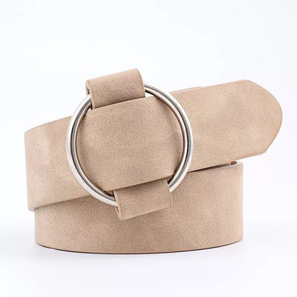 Cream vegan leather belt with silver O-ring buckle.