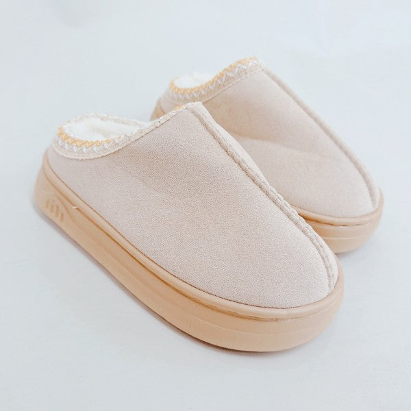 Cream Cozy Cloud Slippers side view highlighting neutral tone and plush texture.
