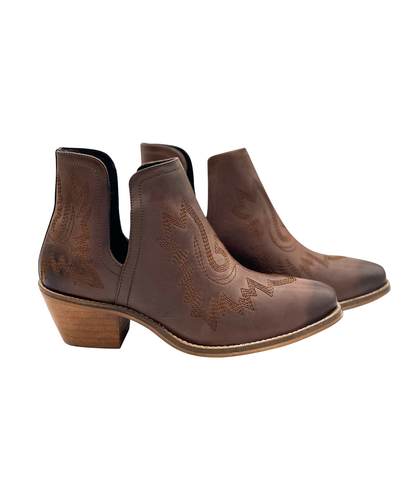 Brown leather booties with Western embroidery, roomy snip toe, cushioned footbed, and ankle slits.