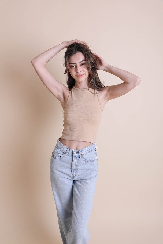 A ribbed racerback brami top in nude, sleeveless, cropped, and pullover style.