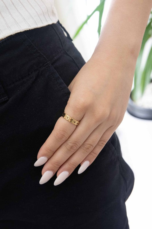 A 14k gold-plated braided ring, available in sizes 6, 7, and 8.