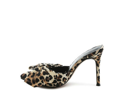 Inside view of Joelle Leopard Print Pump with pointed toe and oversized bow