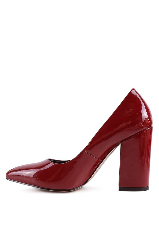 Burgundy Kamira Patent Pumps medial view showing pointed toe design.