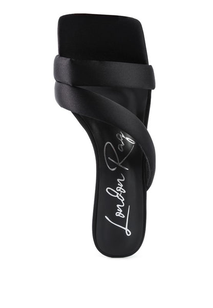 Top view showing black satin cross strap and square toe detail