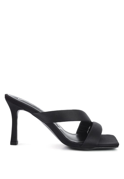 Side profile of black Spice Up Cross Strap Heels with slim high heel