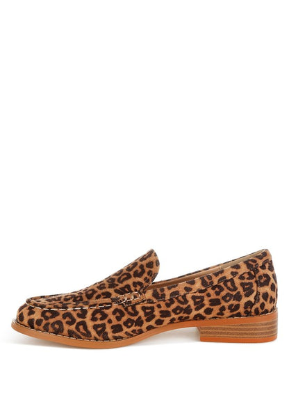 Trendy women's leopard loafers featuring fabric upper, cushioned insole, and stitch detail for all-day comfort.