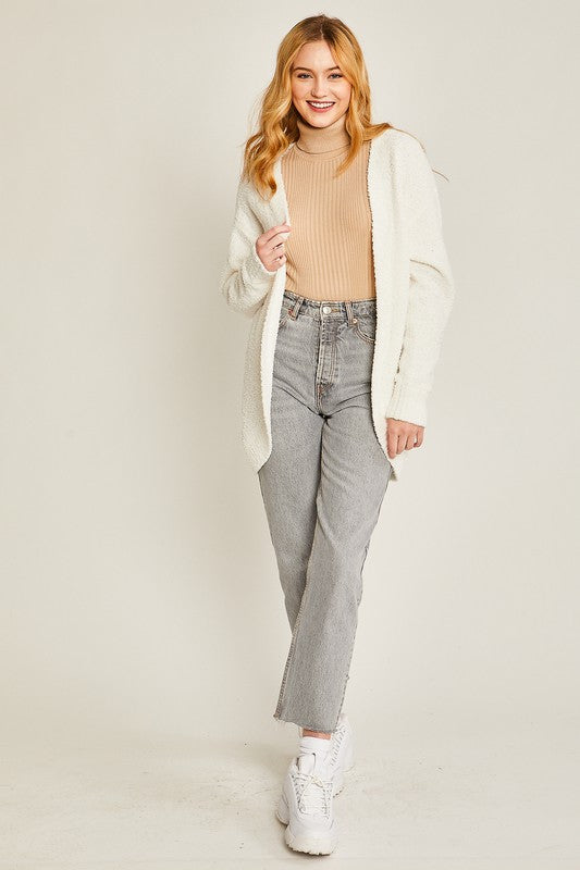 Ivory solid open-front long sweater cardigan with a V-neckline, long sleeves, and a loose fit.