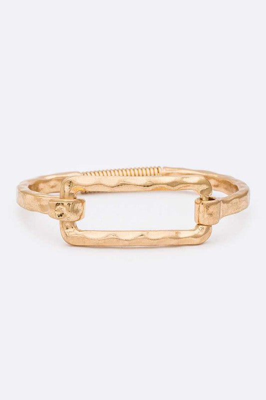 Emma Rectangle Hammered Spring Bangle in worn gold with square front and hammered texture.