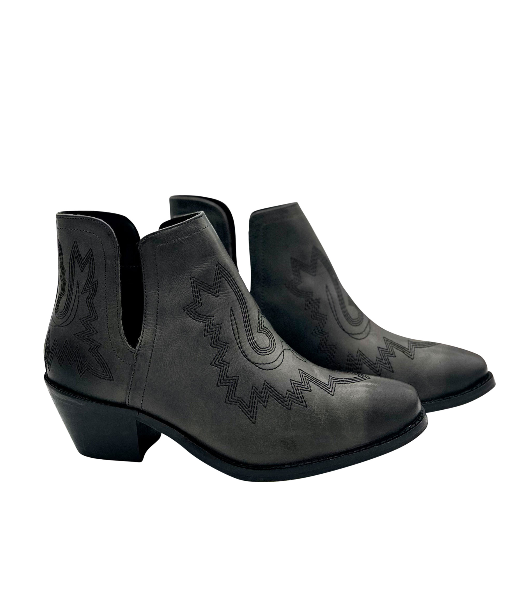 Black leather booties with Western embroidery, roomy snip toe, cushioned footbed, and ankle slits.