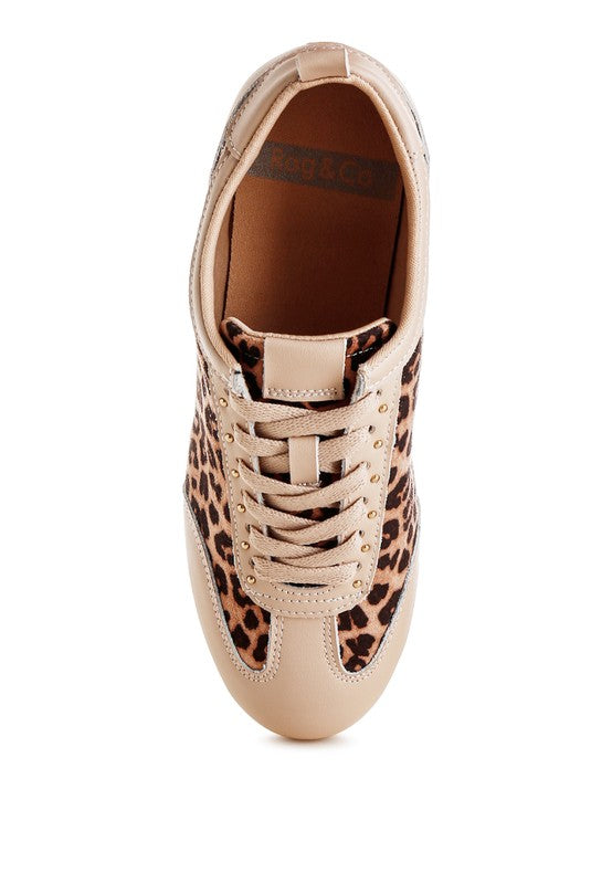Top view of leopard print and beige genuine leather sneakers showing lace-up closure and cushioned insole.