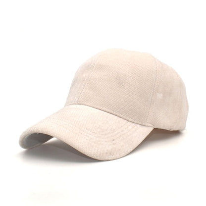 Cream velour ball cap close up highlighting velour finish and curved brim