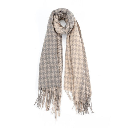 Sofiya Houndstooth Scarf in grey two-tone pattern with fringed edges, draped for a cozy fall look.