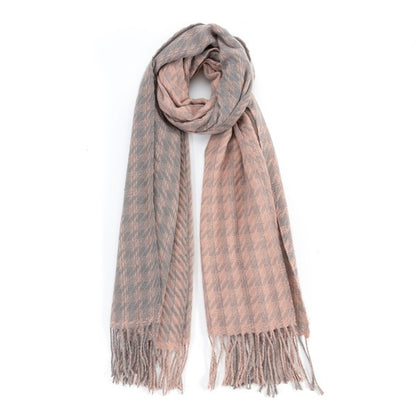 Pink Sofiya Houndstooth Scarf with soft two-tone weave and fringed tassels, styled for a chic layered outfit.