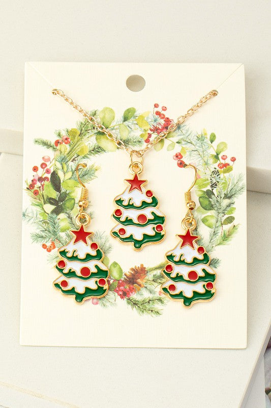 Festive jewelry set with a green and white Christmas tree pendant on an 18" necklace with a 3" extender, and matching drop earrings. 