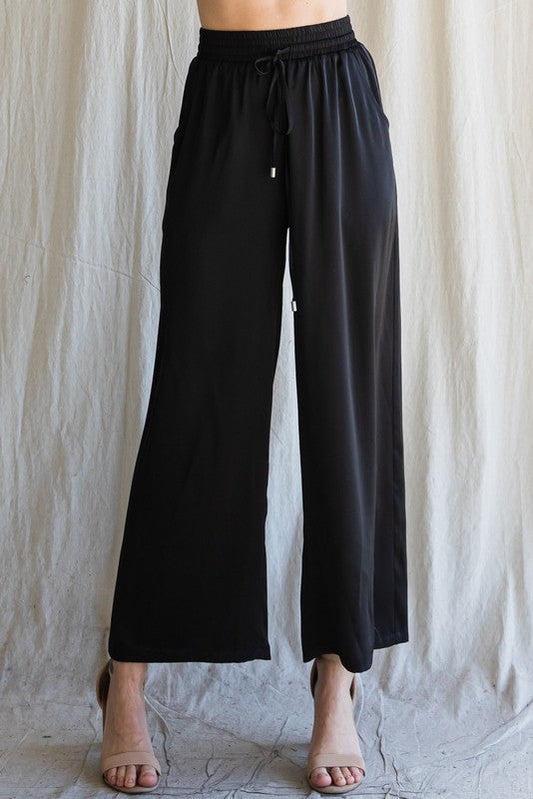 Front view of Cita Wide Leg Bottoms showing cased elastic waistband and adjustable drawstring.