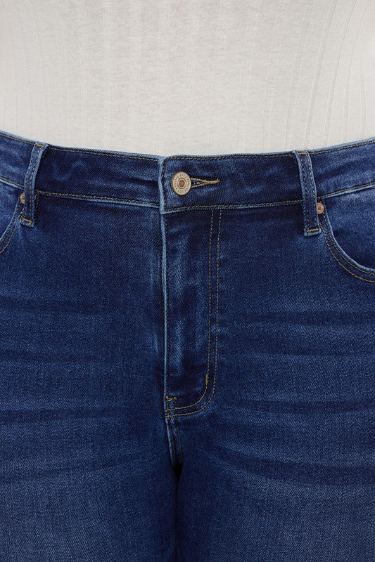 Dark stone wash plus-size slim straight jeans with a high-rise fit, 5-pocket styling, and a zip fly closure.