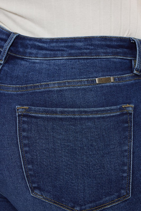 Dark stone wash plus-size slim straight jeans with a high-rise fit, 5-pocket styling, and a zip fly closure.