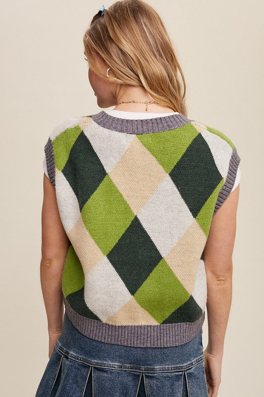 Green, multi-color patterned sweater vest, oversized fit, with a V-neck and sleeveless design.