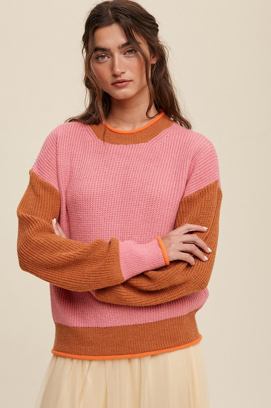 Color block ribbed knit sweater in pink, rust, and orange, featuring a round neckline, drop shoulders, and long sleeves. Regular fit, pullover design.