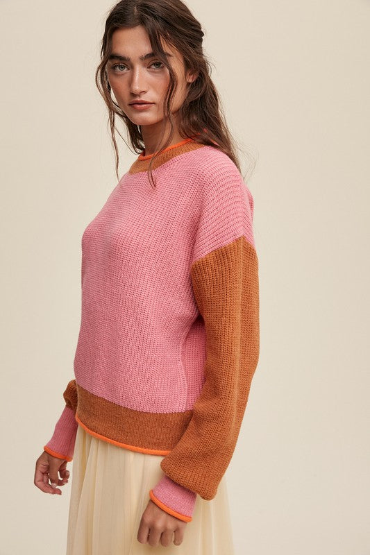 Color block ribbed knit sweater in pink, rust, and orange, featuring a round neckline, drop shoulders, and long sleeves. Regular fit, pullover design.