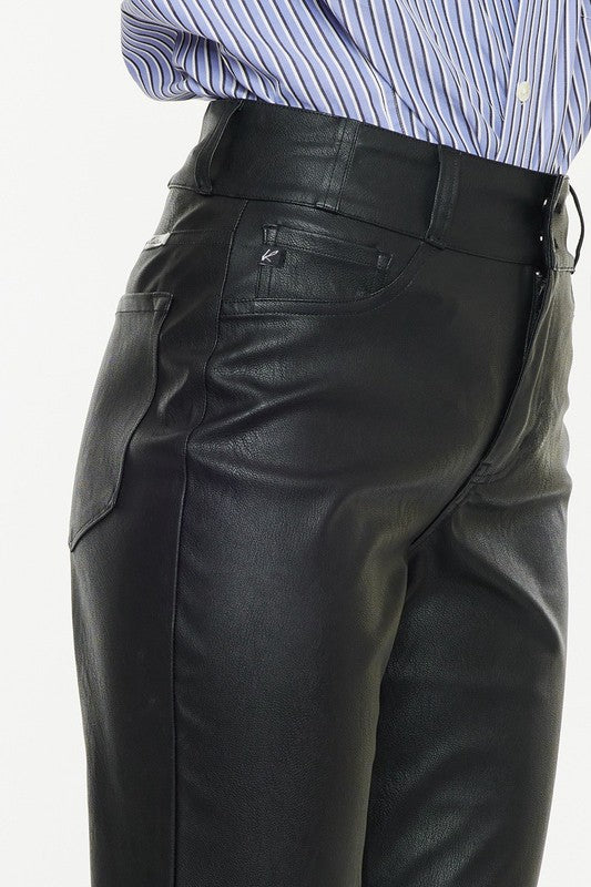 Black faux leather, high rise skinny jeans by Kan Can USA, featuring cropped, straight leg design, and double button closure. 