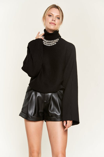 Front view Giada Mock Neck Wide Sleeves Sweater in black with ribbed knit texture.