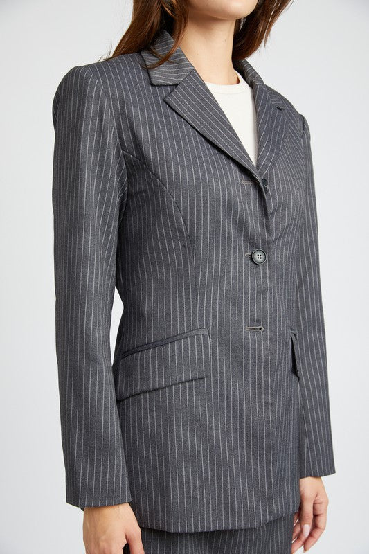 Close up of Clementine Pinstripe Blazer showing lapel, pinstripes, and flap pocket details
