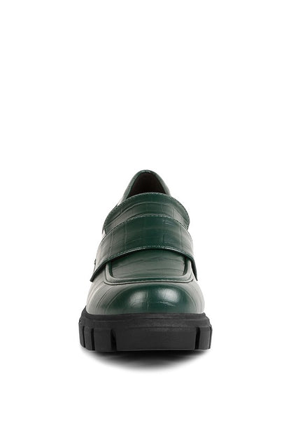 Front view of Benz Platform Loafers in dark green with tassel-free design