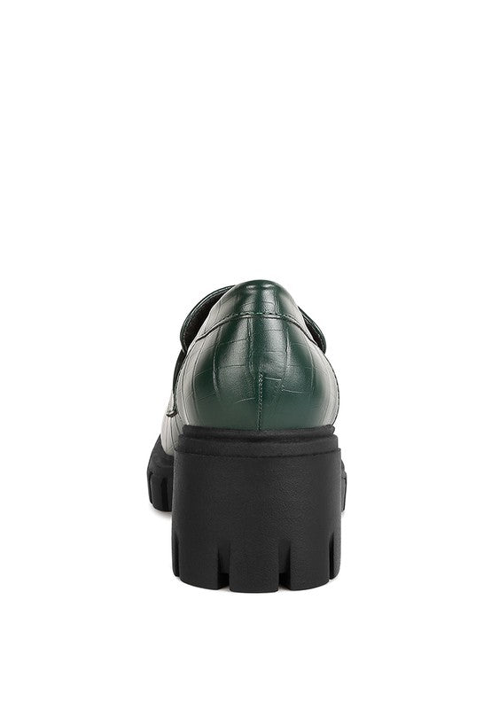 Back view of Benz Platform Loafers in dark green with stacked block heel