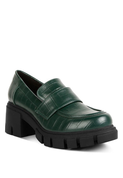 Front angle view of Benz Platform Loafers in dark green croc faux leather