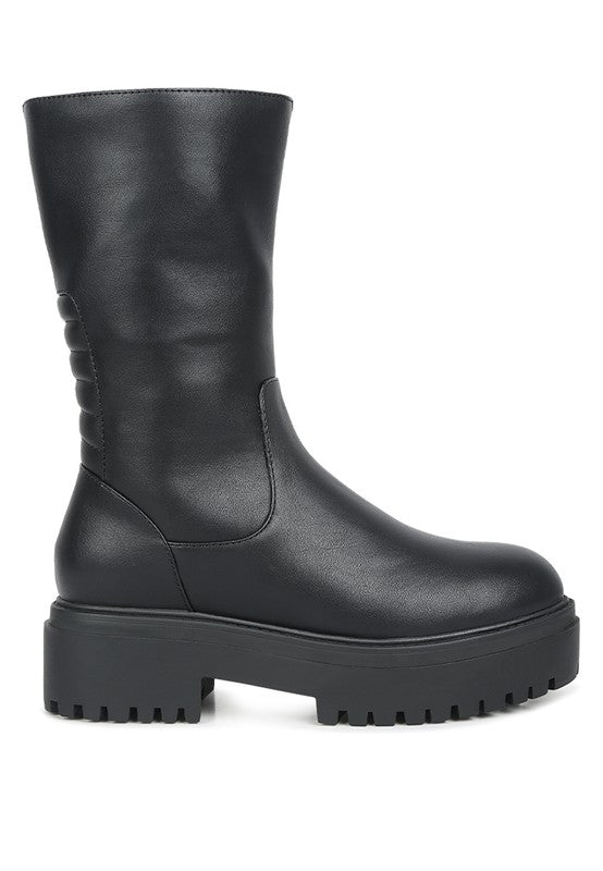 Side view of Lewisa Paneled Lug Sole Boots in black with paneled design
