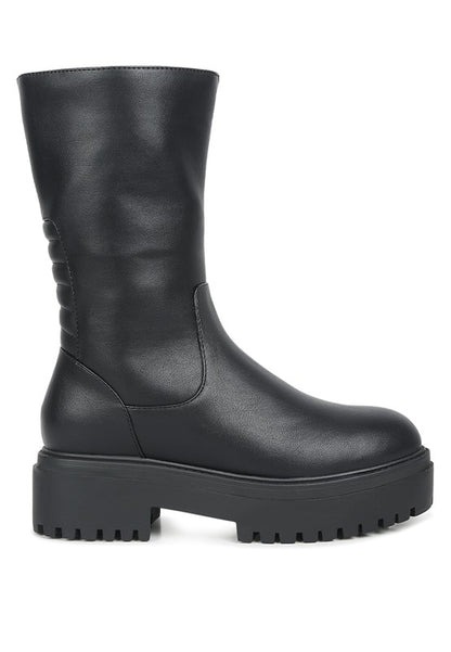 Side view of Lewisa Paneled Lug Sole Boots in black with paneled design