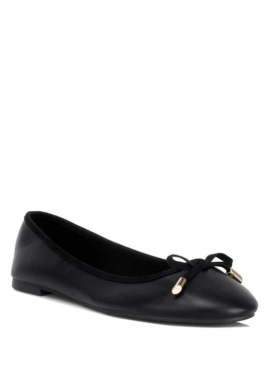 Front angle view of Suzzy Bow Embellished Flat Ballerinas in black faux leather