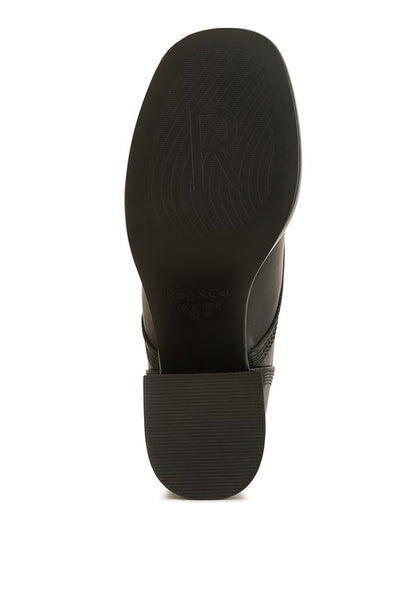 Bottom view of Black Quecha Leather Block Heel Oxfords outsole with logo