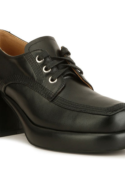 Close-up of Black Quecha Leather Block Heel Oxfords laces and stitching