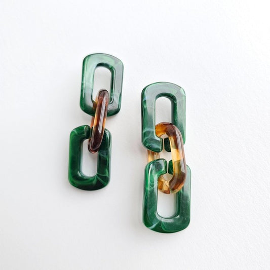 hunky chain-link earrings in amber and forest green resin with hypoallergenic posts.