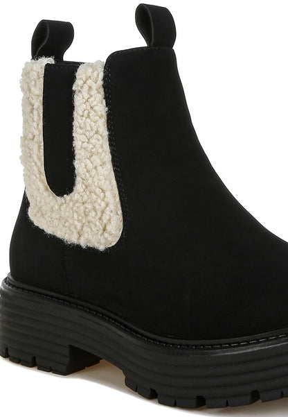 Close-up of Black Mothman Chunky Ankle Boots highlighting faux fur detail and smooth microfiber upper.