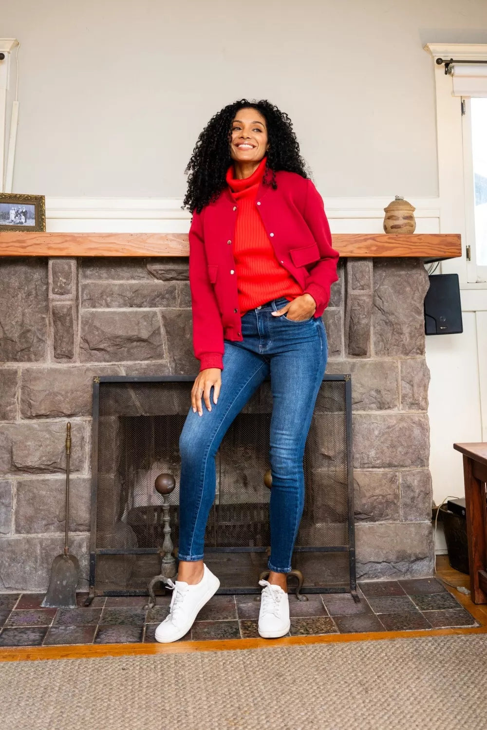 Model walking in Glenda Washed Thermal Skinny Jeans, showing stretch and slim leg design.