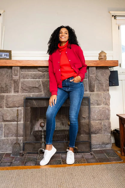 Model walking in Glenda Washed Thermal Skinny Jeans, showing stretch and slim leg design.