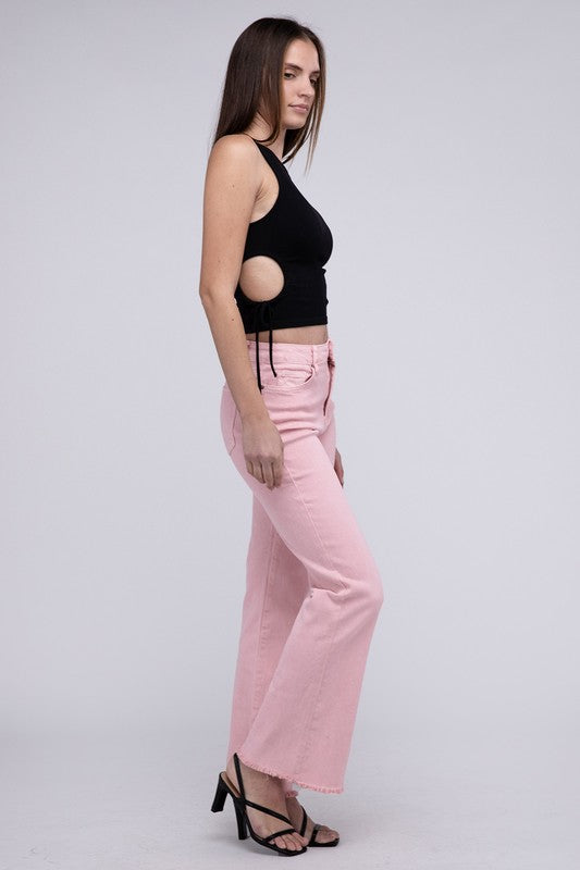 Pink acid-washed straight wide-leg pants featuring a frayed cutoff hem, zip fly closure, and a relaxed fit. Made with stretchy fabric for comfort and a unique vintage-inspired look.